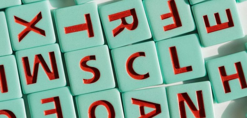 colorful scrabble tiles arrangement in light